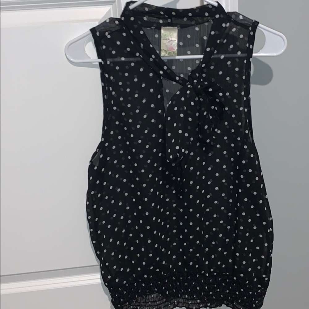 Polka dot tank top blouse that ties in the front.